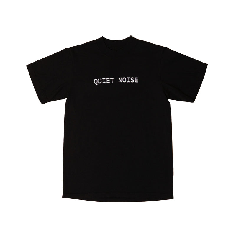 The black Quiet Noise Tee laid flat, with QUIET NOISE printed small at the upper chest.