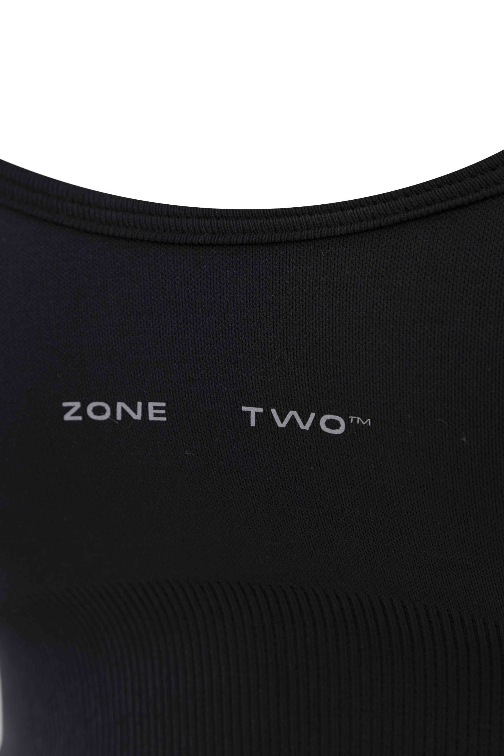 Close-up of the black Top Flow Racerback showing the Zone Two wordmark across the chest.